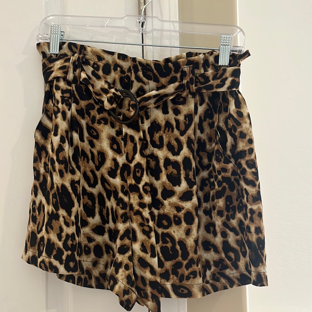Leopard print shorts! Cute and flirty! Has matching leopard print sash belt!